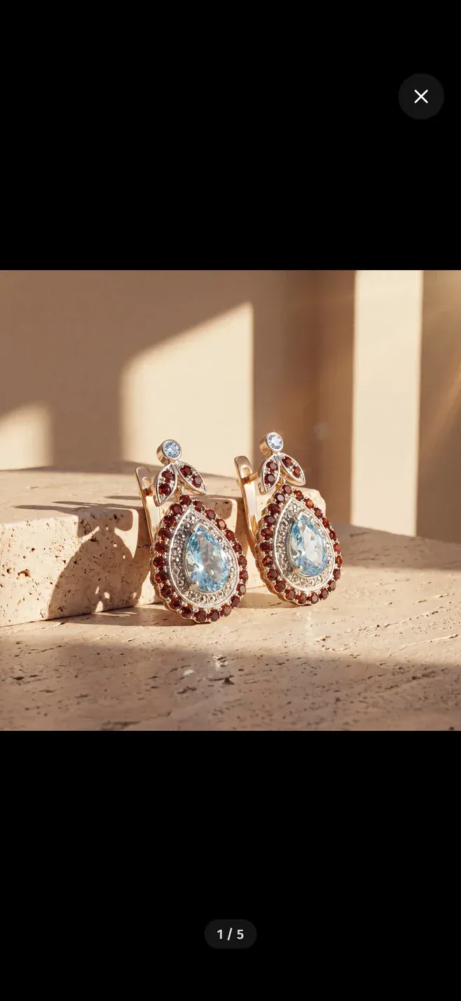 Goldmarket app photo viewer with full bleed jewellery